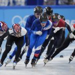
              Teams race in their men's 5000-meters relay semifinal during the short track speedskating competition at the 2022 Winter Olympics, Friday, Feb. 11, 2022, in Beijing. (AP Photo/David J. Phillip)
            
