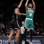 
              Boston Celtics guard Derrick White (9) shoots over Brooklyn Nets guard Cam Thomas (24) during the first half of an NBA basketball game Thursday, Feb. 24, 2022, in New York. (AP Photo/Noah K. Murray)
            