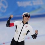 
              Miho Takagi of Japan reacts after her heat against Vanessa Herzog of Austria in the speedskating women's 500-meter race at the 2022 Winter Olympics, Sunday, Feb. 13, 2022, in Beijing. (AP Photo/Sue Ogrocki)
            