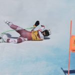 
              Austria's Cornelia Huetter falls during an alpine ski, women's World Cup downhill race, in Crans Montana, Switzerland, Sunday, Feb. 27, 2022. (AP Photo/Giovanni Auletta)
            