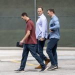 
              Miami Marlins' Trevor Rogers, left, New York Yankees' Jameson Taillon, center and Milwaukee Brewers Brent' Suter arrive at Roger Dean Stadium in Jupiter, Fla., for baseball labor negotiations, Tuesday, Feb. 22, 2022. (Greg Lovett/The Palm Beach Post via AP)
            
