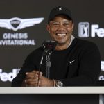 
              Tiger Woods speaks during a news conference for the Genesis Invitational golf tournament at Riviera Country Club, Wednesday, Feb. 16, 2022, in the Pacific Palisades area of Los Angeles. (AP Photo/Ryan Kang)
            