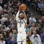 
              Utah Jazz guard Mike Conley shoots during the second half of the team's NBA basketball game against the Golden State Warriors on Wednesday, Feb. 9, 2022, in Salt Lake City. (AP Photo/Rick Bowmer)
            