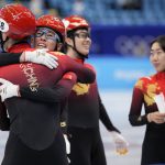 
              Team China celebrate after winning the gold medal in the mixed team relay final during the short track speedskating competition at the 2022 Winter Olympics, Saturday, Feb. 5, 2022, in Beijing. (AP Photo/Natacha Pisarenko)
            