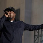 
              Rapper Ice Cube performs during a NASCAR exhibition auto race at Los Angeles Memorial Coliseum, Sunday, Feb. 6, 2022, in Los Angeles. (AP Photo/Marcio Jose Sanchez)
            