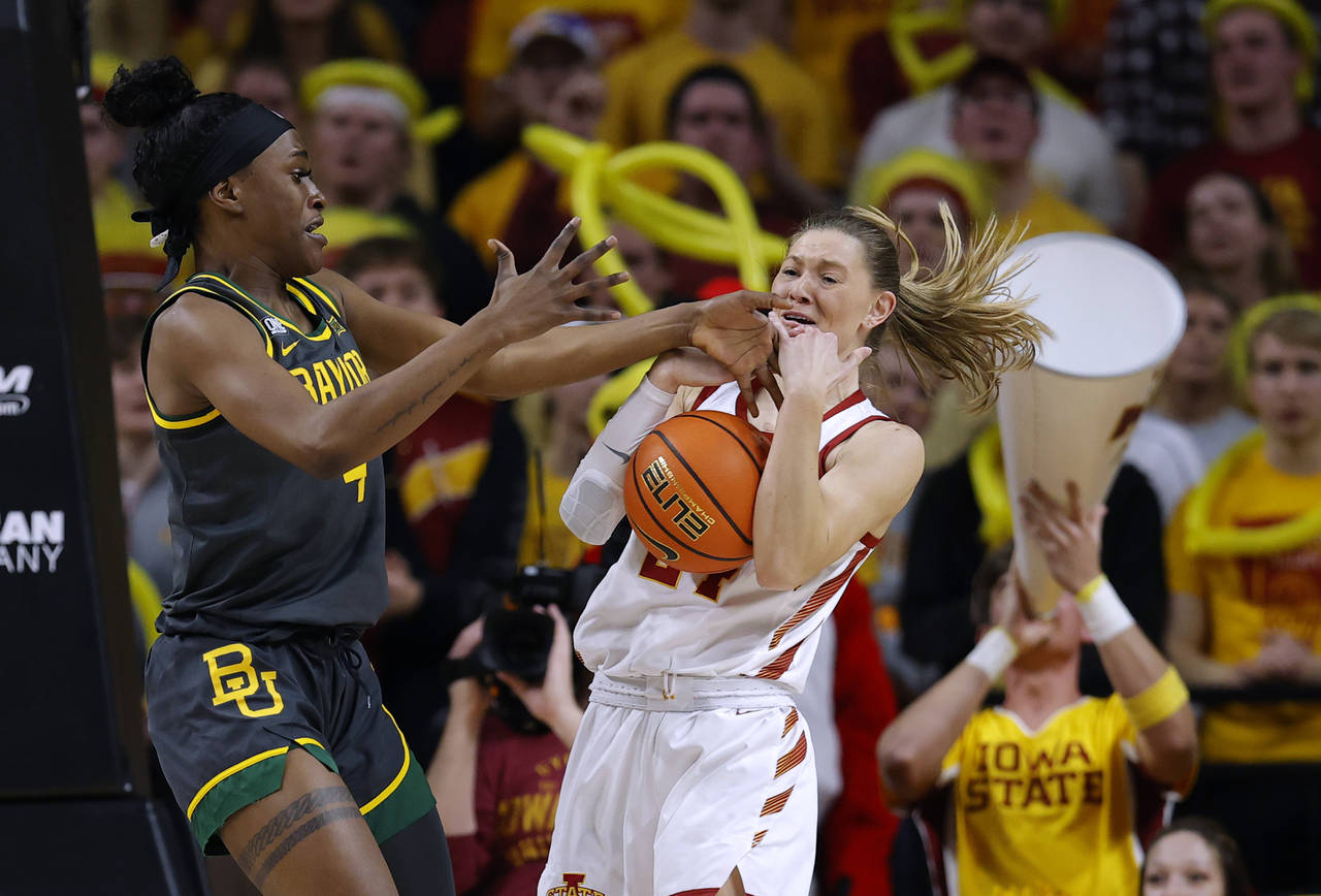 Baylor center Queen Egbo (4) and Iowa State guard Ashley Joens (24) vie for a rebound during the fi...