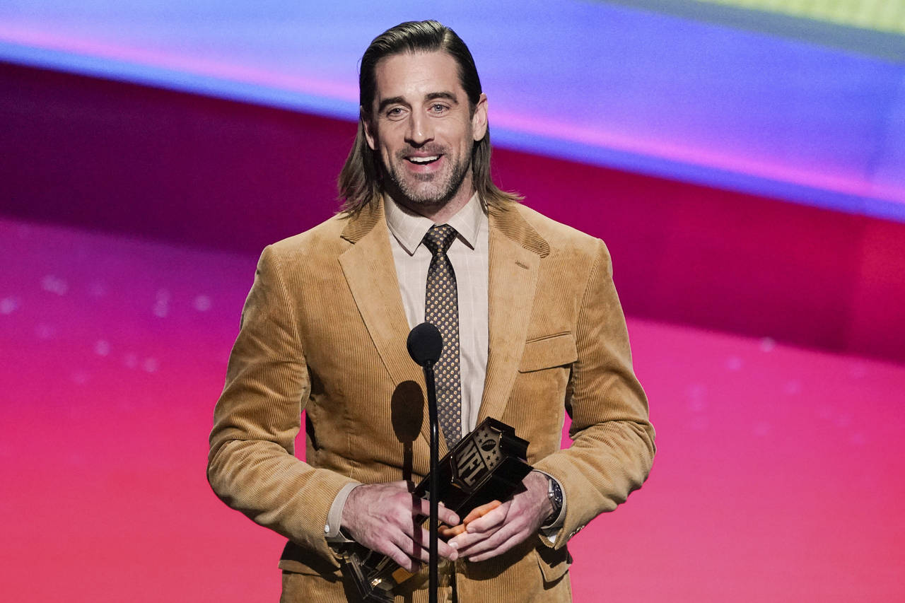 Aaron Rodgers of the Green Bay Packers receives the AP Most Valuable Player of the Year Award at th...