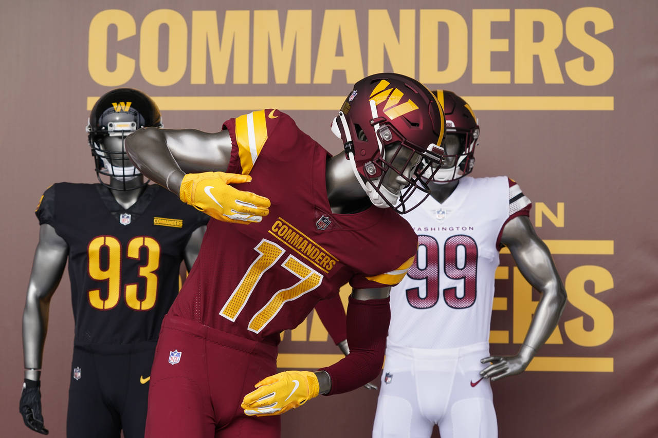 Washington Commanders jerseys are displayed at an event to unveil the NFL football team's new ident...