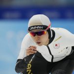 
              Miho Takagi of Japan competes in the women's speedskating 3,000-meter race at the 2022 Winter Olympics, Saturday, Feb. 5, 2022, in Beijing. (AP Photo/Ashley Landis)
            