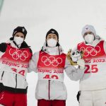 
              silver medal winner, Manuel Fettner, of Austria, left, and bronze medal winner Dawid Kubacki, of Poland, right, pose with gold medal winner Ryoyu Kobayashi, of Japan, after the men's normal hill individual ski jumping event at the 2022 Winter Olympics, Sunday, Feb. 6, 2022, in Zhangjiakou, China. (AP Photo/Andrew Medichini)
            