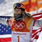 
              FILE - Chloe Kim, of the United States, celebrates winning gold after the women's halfpipe finals at Phoenix Snow Park at the 2018 Winter Olympics in Pyeongchang, South Korea on Feb. 13, 2018. Kim is eyeing a second gold medal on the halfpipe on her terms at the 2022 Winter Olympics in Beijing. Kim stormed to victory as a teenager in Korea four years ago before taking an extended break. (AP Photo/Gregory Bull, File)
            