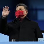 
              President of China Xi Jinping waves during the closing ceremony of the 2022 Winter Olympics, Sunday, Feb. 20, 2022, in Beijing. (AP Photo/Jae C. Hong)
            