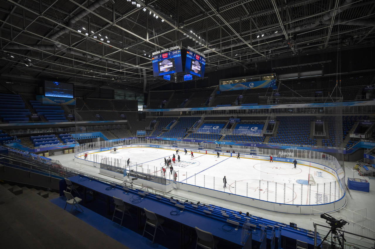 Hockey teams practice on the ice at National Indoor Stadium in Beijing, Wednesday, Nov. 10, 2021. T...