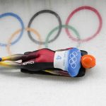 
              Christopher Grotheer, of Germany, slides during men's skeleton run 3 at the 2022 Winter Olympics, Friday, Feb. 11, 2022, in the Yanqing district of Beijing. (AP Photo/Pavel Golovkin)
            