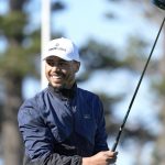 
              Mookie Betts smile after hitting from the 10th tee of the Spyglass Hill Golf Course during the second round of the AT&T Pebble Beach Pro-Am golf tournament in Pebble Beach, Calif., Friday, Feb. 4, 2022. (AP Photo/Tony Avelar)
            