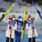 
              From left, Tiril Eckhoff of Norway, Justine Braisaz-Bouchet of France and Marte Olsbu Roeiseland of Norway pose after the women's 12.5-kilometer mass start biathlon at the 2022 Winter Olympics, Friday, Feb. 18, 2022, in Zhangjiakou, China. (AP Photo/Kirsty Wigglesworth)
            