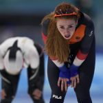 
              Antoinette de Jong of the Netherlands reacts after winning her heat against Ayano Sato of Japan during the women's speedskating 3,000-meter race at the 2022 Winter Olympics, Saturday, Feb. 5, 2022, in Beijing. (AP Photo/Sue Ogrocki)
            