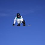 
              Hiroaki Kunitake of Japan competes during the men's snowboard big air qualifications of the 2022 Winter Olympics, Monday, Feb. 14, 2022, in Beijing. (AP Photo/Jae C. Hong)
            