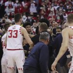 
              A fight breaks out on the court after the Wisconsin NCAA college basketball game against Michigan in Madison, Wis., Sunday, Feb. 20, 2022. (Amber Arnold/Wisconsin State Journal via AP)
            