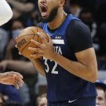 
              Minnesota Timberwolves center Karl-Anthony Towns (32) reacts to a referee's foul call against him and for the Detroit Pistons in the third quarter of an NBA basketball game Sunday, Feb. 6, 2022, in Minneapolis. (AP Photo/Bruce Kluckhohn)
            