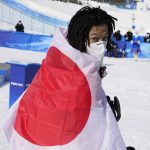 
              Gold medal winner Japan's Ayumu Hirano celebrates after the men's halfpipe finals at the 2022 Winter Olympics, Friday, Feb. 11, 2022, in Zhangjiakou, China. (AP Photo/Andrew Medichini)
            