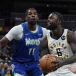 
              Indiana Pacers' Lance Stephenson (6) goes to the basket against Minnesota Timberwolves' Naz Reid (11) during the second half of an NBA basketball game, Sunday, Feb. 13, 2022, in Indianapolis. (AP Photo/Darron Cummings)
            
