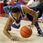 
              Kansas State guard Markquis Nowell (1) runs down a loose ball during the first half of an NCAA college basketball game against Iowa State, Saturday, Feb. 12, 2022, in Ames, Iowa. (AP Photo/Charlie Neibergall)
            