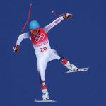 
              FILE - Ryan Cochran-Siegle of the United States makes a jump during a men's downhill training run at the 2022 Winter Olympics, Thursday, Feb. 3, 2022, in the Yanqing district of Beijing. The U.S. Alpine skiing team in Beijing is entirely white. The U.S. snowboarders and freestyle skiers include Asian American riders, but none that are Black or Hispanic. "It's incredibly unfortunate," said Cochran-Siegle, "we all want to figure out ways to close those gaps between different minorities and their access to skiing." (AP Photo/Robert F. Bukaty, File)
            