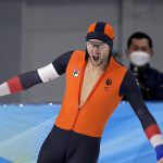 
              Thomas Krol of the Netherlands reacts after his heat in the men's speedskating 1,500-meter race at the 2022 Winter Olympics, Tuesday, Feb. 8, 2022, in Beijing. (AP Photo/Sue Ogrocki)
            
