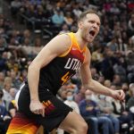 
              Utah Jazz forward Bojan Bogdanovic (44) shouts at an official as he runs up the court during the second half of the team's NBA basketball game against the Denver Nuggets on Wednesday, Feb. 2, 2022, in Salt Lake City. (AP Photo/Rick Bowmer)
            