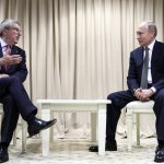 
              FILE - International Olympic Committee President Thomas Bach, left, talks during a meeting with Russian President Vladimir Putin at the Second European Games in Minsk, Belarus, June 30, 2019. In a sweeping move to isolate and condemn Russia after invading Ukraine, the International Olympic Committee urged sports bodies on Monday, Feb. 28, 2022, to exclude the country's athletes and officials from international events. (Sergey Bobylev, TASS/Sputnik, Kremlin Pool Photo via AP, File)
            
