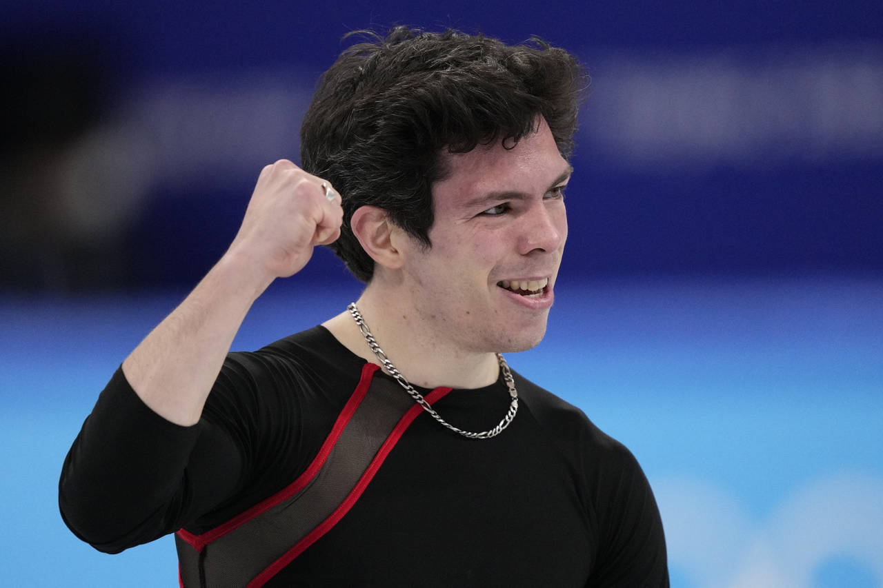 Keegan Messing, of Canada, competes during the men's short program figure skating competition at th...