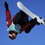 
              Mark McMorris of Canada competes during the men's snowboard big air qualifications of the 2022 Winter Olympics, Monday, Feb. 14, 2022, in Beijing. (AP Photo/Jae C. Hong)
            