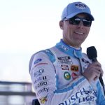 
              Kevin Harvick answers questions after a practice session at Los Angeles Memorial Coliseum ahead of a NASCAR exhibition auto race Saturday, Feb. 5, 2022, in Los Angeles. (AP Photo/Marcio Jose Sanchez)
            