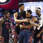 
              Auburn guard Wendell Green Jr. (1) celebrates with teammates after a basket late in the second half of an NCAA college basketball game against Georgia, Saturday, Feb. 5, 2022, in Athens, Ga. (AP Photo/John Bazemore)
            