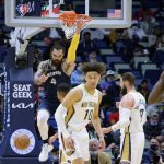 
              Memphis Grizzlies center Steven Adams (4) dunks against the New Orleans Pelicans during the first half of an NBA basketball game in New Orleans, Tuesday, Feb. 15, 2022. (AP Photo/Matthew Hinton)
            