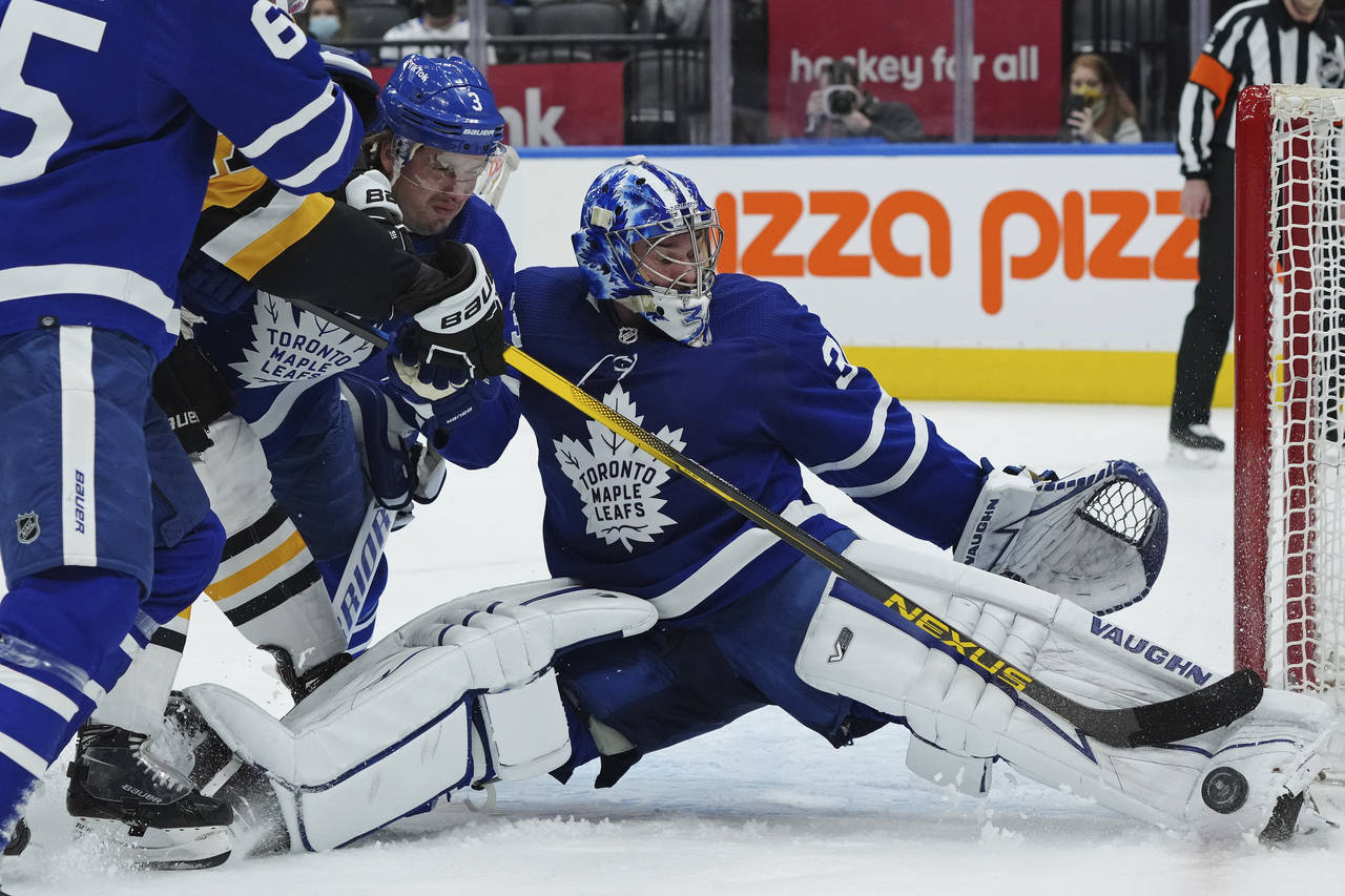 Toronto Maple Leafs goaltender Jack Campbell (36) makes a save on Pittsburgh Penguins forward Bryan...