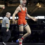 
              Oklahoma State's Trevor Mastrogiovanni celebrates his victory over Iowa's  Jesse Ybarra (Iowa) in the Bout at the Ballpark college wrestling dual Saturday, Feb. 12, 2022, at Globe Life Field in Arlington, Texas. (Steve Nurenberg/The Dallas Morning News via AP)
            