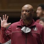
              Florida State coach Leonard Hamilton signals to the team during the second half of an NCAA college basketball game against Duke in Durham, N.C., Saturday, Feb. 19, 2022. (AP Photo/Gerry Broome)
            