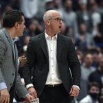 
              Connecticut coach Dan Hurley, center, reacts during the first half of the team's NCAA college basketball game against Villanova, Tuesday, Feb. 22, 2022, in Hartford, Conn. Hurley was ejected. (AP Photo/Jessica Hill)
            