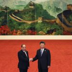
              FILE- Egypt's President Abdel Fattah al-Sisi, left, shakes hands with Chinese President Xi Jinping during the Forum on China-Africa Cooperation held at the Great Hall of the People in Beijing, Monday, Sept. 3, 2018. The U.S., Britain and a handful of others aren’t sending dignitaries to the Beijing Games as part of a diplomatic boycott, but the Chinese capital is still attracting an array of world leaders for the opening ceremony on Friday, Feb. 4, 2022. Egypt is also among those whose governments have boosted ties with Beijing, as el-Sissi seeks to move away from Western leaders who have concerns over his human rights record. (AP Photo/Andy Wong, Pool, File)
            