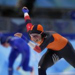 
              Irene Schouten of the Netherlands competes against Francesca Lollobrigida of Italy in the women's speedskating 3,000-meter race at the 2022 Winter Olympics, Saturday, Feb. 5, 2022, in Beijing. Schouten won the gold medal and set an Olympic record. (AP Photo/Sue Ogrocki)
            