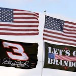 
              A "Let's go Brandon" flag flies with others Friday, Feb. 18, 2022, at Daytona International Speedway in Daytona Beach, Fla. (AP Photo/Chris O'Meara)
            