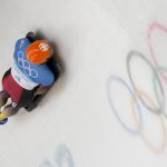 
              Christopher Grotheer, of Germany, slides during men's skeleton run 2 at the 2022 Winter Olympics, Thursday, Feb. 10, 2022, in the Yanqing district of Beijing. (AP Photo/Dmitri Lovetsky)
            