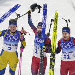 
              From left Elvira Oeberg of Sweden (2), Marte Olsbu Roeiseland of Norway (1) and Tiril Eckhoff of Norway stand after the women's 10-kilometer pursuit race at the 2022 Winter Olympics, Sunday, Feb. 13, 2022, in Zhangjiakou, China. (AP Photo/Kirsty Wigglesworth)
            