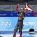 
              Laurent Dubreuil of Canada reacts after winning the silver medal in the final heat during the men's speedskating 1,000-meter finals at the 2022 Winter Olympics, Friday, Feb. 18, 2022, in Beijing. (AP Photo/Ashley Landis)
            