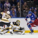 
              New York Rangers center Filip Chytil (72) scores on Boston Bruins goaltender Jeremy Swayman (1) in the third period of an NHL hockey game, Tuesday, Feb. 15, 2022, in New York. (AP Photo/John Minchillo)
            