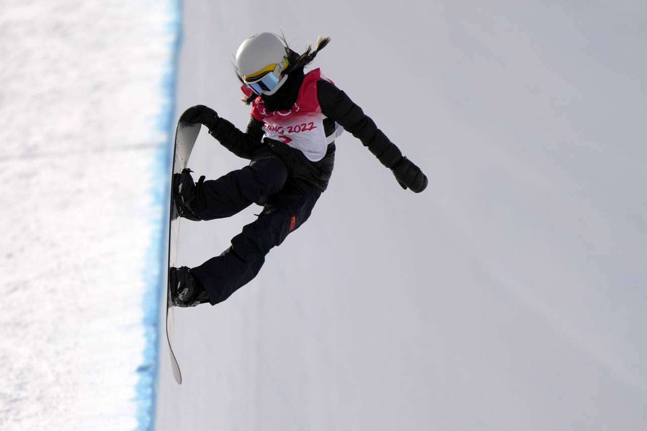 United States' Chloe Kim trains on the halfpipe curse at the 2022 Winter Olympics, Monday, Feb. 7, ...