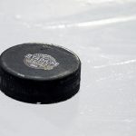 
              A puck is on the ice during a Nashville Predators hockey practice in preparation for the Navy Federal Credit Union NHL Stadium Series at Nissan Stadium in Nashville, Tenn., Friday, Feb. 25, 2022. (Andrew Nelles/The Tennessean via AP)
            
