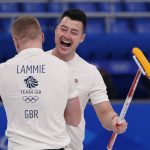 
              Britain's Hammy McMillan celebrates with Bobby Lammie after winning the men's curling semifinal match against the United States at the Beijing Winter Olympics Thursday, Feb. 17, 2022, in Beijing. (AP Photo/Brynn Anderson)
            